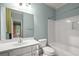 This bathroom features a tub shower, a large vanity, and a view into the bedroom at 7940 Gable Dr, Douglasville, GA 30135