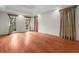 Large primary bedroom with hardwood floors and big windows at 7940 Gable Dr, Douglasville, GA 30135