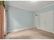 Spacious bedroom with double closets, ensuite entrance, and neutral paint at 7940 Gable Dr, Douglasville, GA 30135