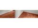 Warm hardwood flooring is visible in this close-up image of the corner of a room at 7940 Gable Dr, Douglasville, GA 30135
