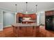 Beautiful kitchen with a large center island, granite countertops, and stainless steel appliances at 7940 Gable Dr, Douglasville, GA 30135
