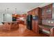 Well-appointed kitchen with custom cabinets, stainless steel appliances, and granite countertops at 7940 Gable Dr, Douglasville, GA 30135
