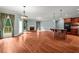 Open concept living area seamlessly integrates the living room and kitchen with hardwood floors at 7940 Gable Dr, Douglasville, GA 30135