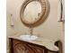 A bathroom sink with detailed counter and mirror at 878 Middle Fork Trl, Suwanee, GA 30024