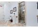 Elegant bathroom featuring a toilet and glass enclosed shower at 878 Middle Fork Trl, Suwanee, GA 30024