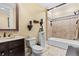 A unique bathroom includes a vintage style urinal, tiled shower, and granite vanity top at 878 Middle Fork Trl, Suwanee, GA 30024