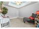 Bright bedroom with a cloud ceiling, creating a dreamy and relaxing atmosphere at 878 Middle Fork Trl, Suwanee, GA 30024