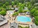 Aerial view of the community pool featuring a large swimming area and lounging space at 878 Middle Fork Trl, Suwanee, GA 30024