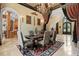 Elegant dining area with access to the kitchen and foyer at 878 Middle Fork Trl, Suwanee, GA 30024