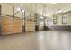 A well-lit garage with multiple bay doors and epoxy flooring at 878 Middle Fork Trl, Suwanee, GA 30024
