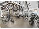 Bright gym featuring state-of-the-art fitness equipment, exposed beams, and mirrored walls at 878 Middle Fork Trl, Suwanee, GA 30024