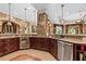 Spacious kitchen with stainless steel appliances, granite counters, and custom cabinets at 878 Middle Fork Trl, Suwanee, GA 30024