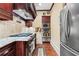 Gourmet kitchen with stainless steel appliances and custom cabinetry at 878 Middle Fork Trl, Suwanee, GA 30024