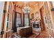 Intimate home office with custom wood paneling and a cozy fireplace at 878 Middle Fork Trl, Suwanee, GA 30024
