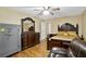 Inviting bedroom featuring ensuite bath, hardwood floors and walk-in closet at 24 Fossetts Nw Cv, Cartersville, GA 30121