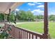 Relaxing porch with view of a sprawling front yard at 24 Fossetts Nw Cv, Cartersville, GA 30121