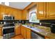 The kitchen boasts stainless steel appliances and granite countertops, creating a modern cooking experience at 24 Fossetts Nw Cv, Cartersville, GA 30121