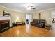 Bright and airy living room with hardwood floors and cozy furniture at 24 Fossetts Nw Cv, Cartersville, GA 30121