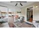 Inviting covered porch with comfortable seating and an open doorway to the interior, great for outdoor living at 24 Fossetts Nw Cv, Cartersville, GA 30121