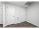 Hallway with wood flooring and white doors at 2733 Creek View Nw Ter, Atlanta, GA 30318