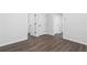 Hallway with wood flooring and white doors at 2733 Creek View Nw Ter, Atlanta, GA 30318
