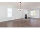 Spacious living room with fireplace and large windows at 2733 Creek View Nw Ter, Atlanta, GA 30318