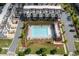 Aerial view of the community pool and amenity area with green space surrounding the community at 1030 Burnside Nw Pl, Atlanta, GA 30318