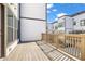 Spacious deck with wood railing, perfect for outdoor seating and enjoying the views at 1030 Burnside Nw Pl, Atlanta, GA 30318
