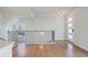 Entryway view of the home with hardwood floors, modern staircase, and natural light at 1030 Burnside Nw Pl, Atlanta, GA 30318