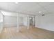 Spacious finished basement with new flooring, neutral paint, and access to utilities at 2158 Oregon Ct, Decatur, GA 30032