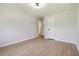 Empty bedroom with wood-look floors and neutral walls at 2158 Oregon Ct, Decatur, GA 30032