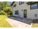 Home exterior featuring brick, a patio, and manicured shrubs at 2158 Oregon Ct, Decatur, GA 30032