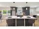 Stylish kitchen boasts an island with seating, modern cabinetry, and natural light at 2158 Oregon Ct, Decatur, GA 30032