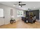 Cozy living room with fireplace, hardwood floors, and neutral paint at 2158 Oregon Ct, Decatur, GA 30032
