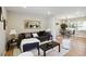 Inviting living room with hardwood floors, stylish decor, and an open connection to the dining area at 2158 Oregon Ct, Decatur, GA 30032