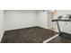 Spacious basement area with durable flooring and adjacent room, perfect for home gym or storage at 3845 Pilgrim Mill Rd, Cumming, GA 30041