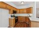 Functional kitchen with wood cabinets, stainless steel appliances, and white countertops at 3845 Pilgrim Mill Rd, Cumming, GA 30041