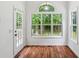 Bright kitchen nook with large windows and door, filling the space with natural light at 3845 Pilgrim Mill Rd, Cumming, GA 30041