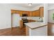 Efficient kitchen featuring oak cabinets, stainless steel appliances, and laminate countertops at 3845 Pilgrim Mill Rd, Cumming, GA 30041