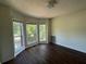 Bright bedroom featuring a bay window and hardwood floors at 1100 Whistle Dr, Austell, GA 30106