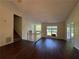 Bright living room with hardwood floors, staircase, and a view to the outside at 1100 Whistle Dr, Austell, GA 30106