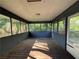 Enclosed sunroom or porch with windows all around offering natural light and views at 1100 Whistle Dr, Austell, GA 30106