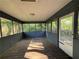 Enclosed sunroom or porch with windows all around offering natural light and views at 1100 Whistle Dr, Austell, GA 30106