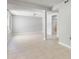 Unfinished basement space with tile flooring and support columns with a view of closet space at 1505 Cedar Bluff Trl, Marietta, GA 30062