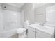 All white bathroom with shower and tub, standard toilet, and a single sink vanity at 1505 Cedar Bluff Trl, Marietta, GA 30062