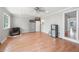 Bonus room with laminate wood floors and large sliding door leading to backyard at 1505 Cedar Bluff Trl, Marietta, GA 30062