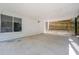 Covered back patio featuring concrete flooring and an open space concept and backyard access at 1505 Cedar Bluff Trl, Marietta, GA 30062