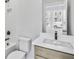 Bathroom features white subway tile, a dark faucet, and white quartz countertop at 2611 Alcovy Ne Trl, Marietta, GA 30066