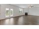 Unfurnished living room featuring an electric fireplace and hardwood flooring at 294 Ralph Still Rd, Dacula, GA 30019