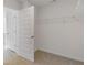 Walk-in closet with wire shelving and close proximity to a bathroom at 294 Ralph Still Rd, Dacula, GA 30019